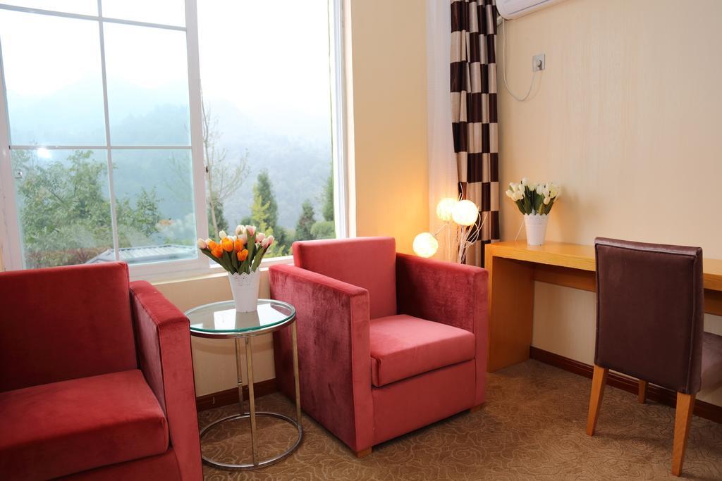 Panshan Tingquan Tuwo Holiday Resort Leshan Rum bild