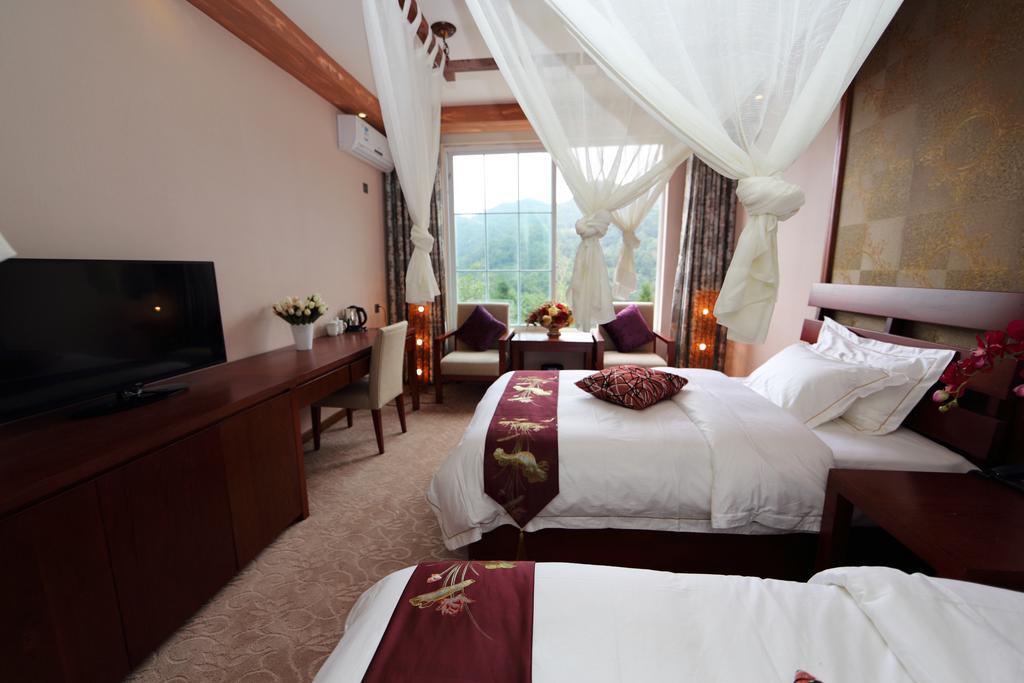 Panshan Tingquan Tuwo Holiday Resort Leshan Rum bild