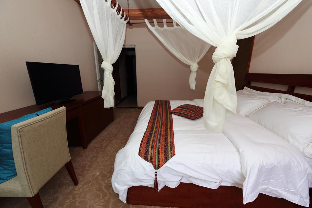 Panshan Tingquan Tuwo Holiday Resort Leshan Rum bild