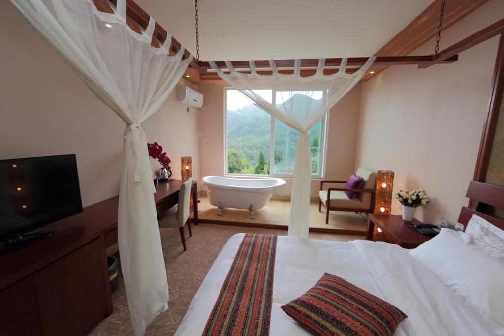 Panshan Tingquan Tuwo Holiday Resort Leshan Rum bild