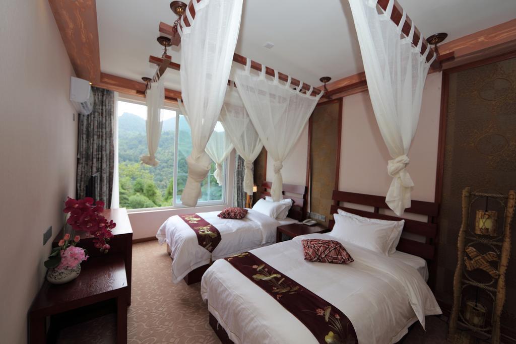 Panshan Tingquan Tuwo Holiday Resort Leshan Rum bild